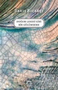 Doğum Lekesi Gibi Bir Gülümseme